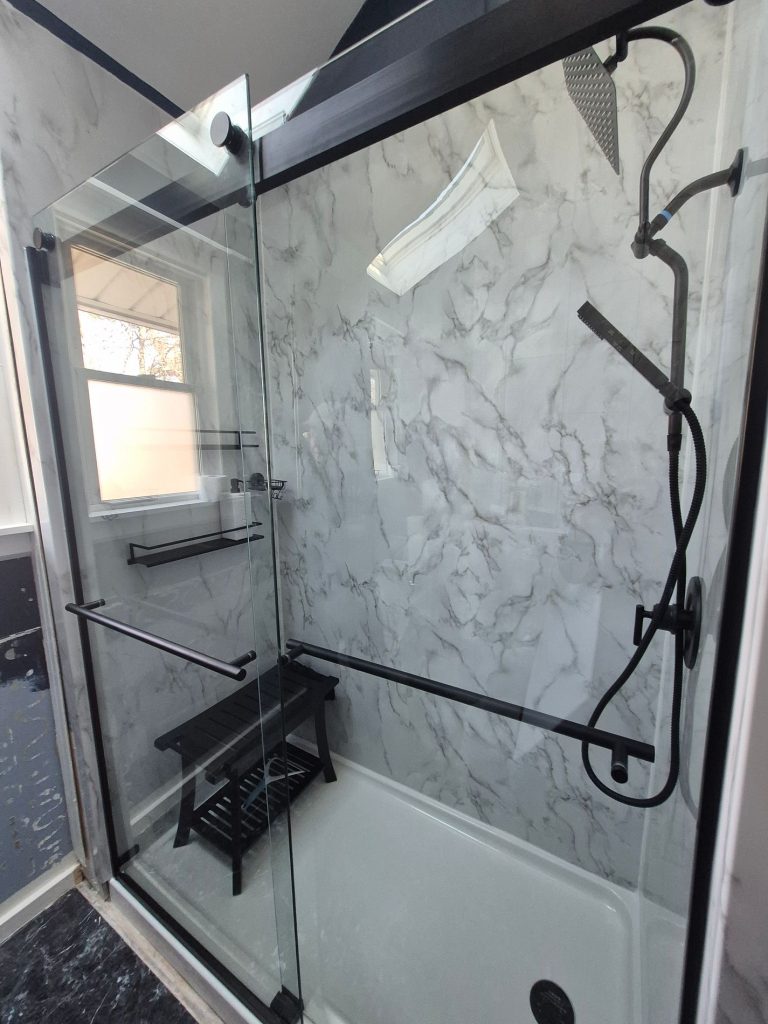 shower remodel with marble wall panels