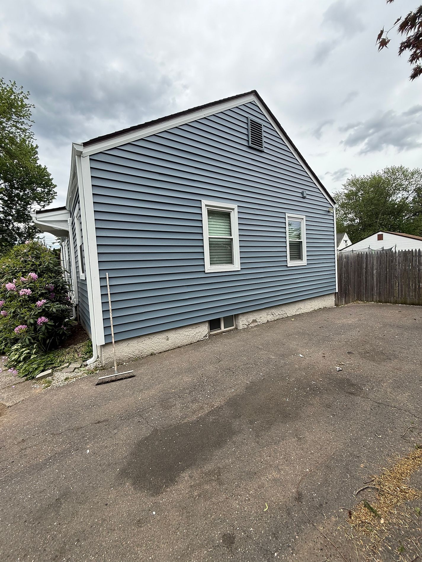 Second angle of completed Alside vinyl siding installation on Milbrook Drive East Hartford CT