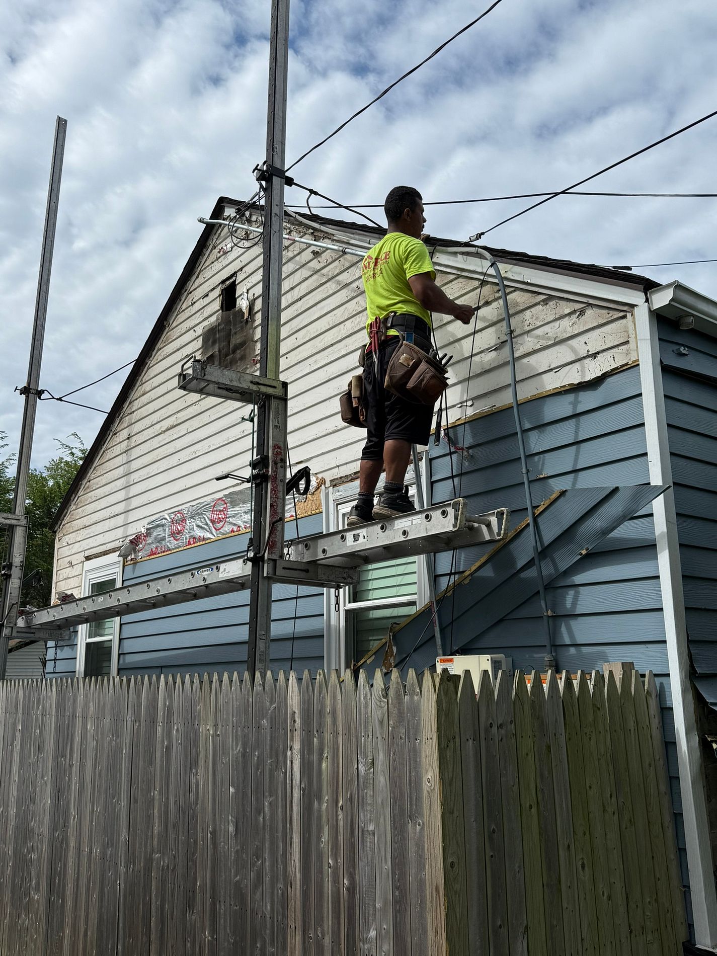 Second during angle of Milbrook Drive East Hartford CT siding installation