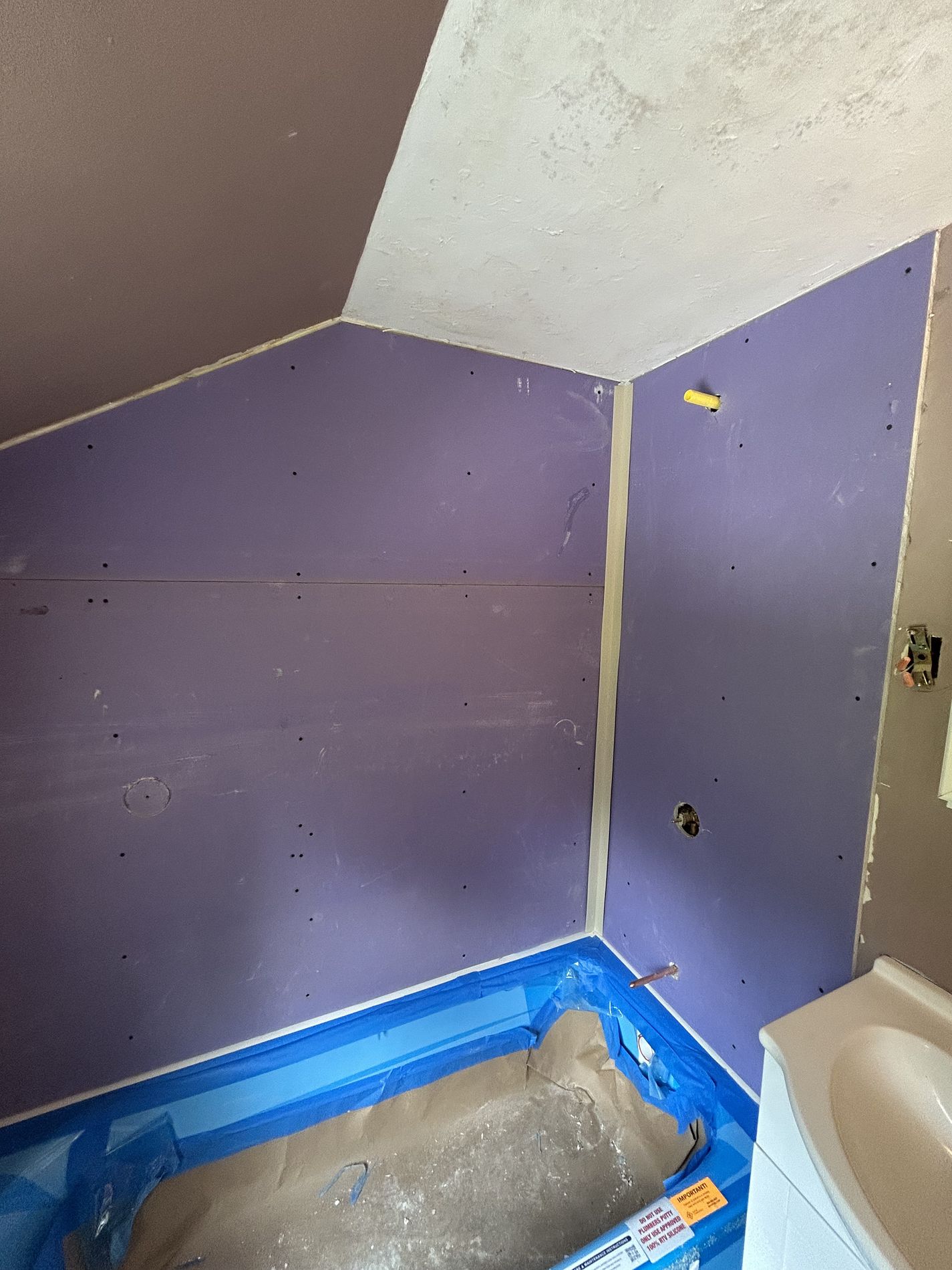 Brookfield Drive East Hartford CT bathroom remodel in progress showing Luxury Bath panel installation