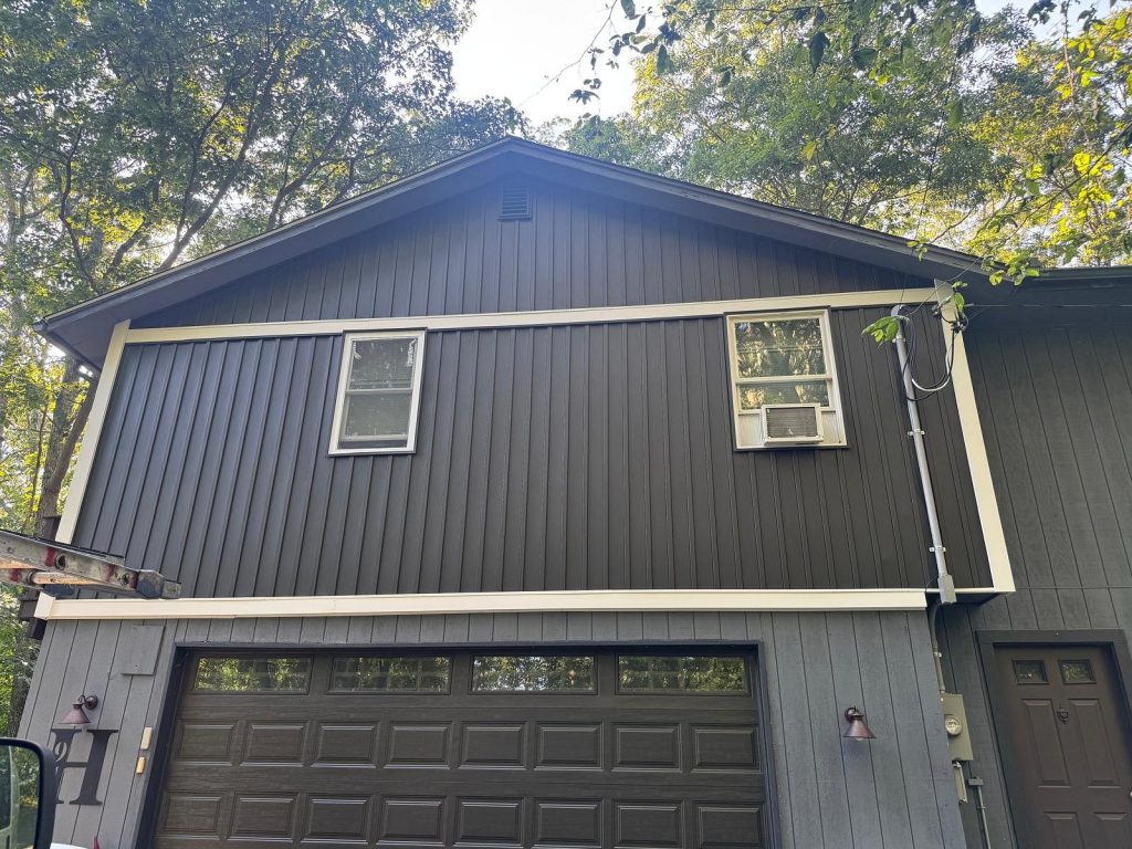 Home with vertical board and batten siding