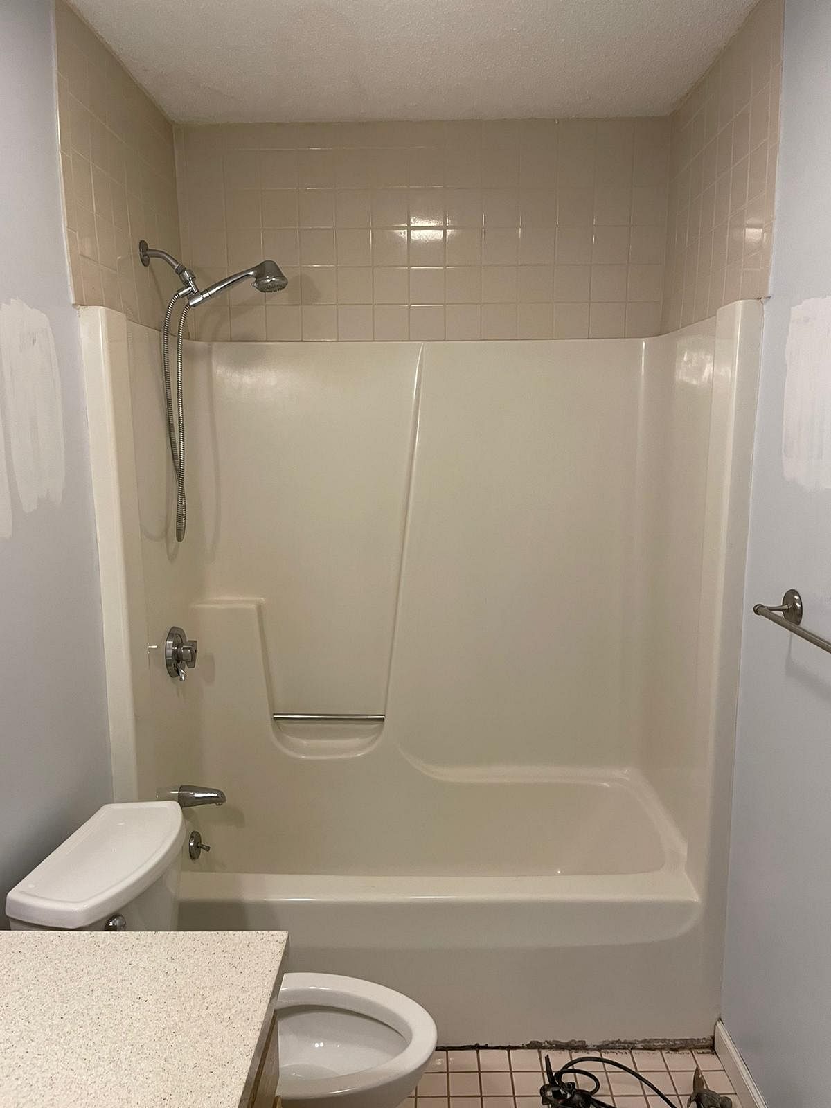 Original tub and fiberglass surround on Clock Shop Drive Berlin CT before Nu-Face removal and walk-in shower conversion