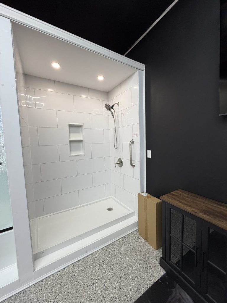 Walk-in shower display with tile surround 