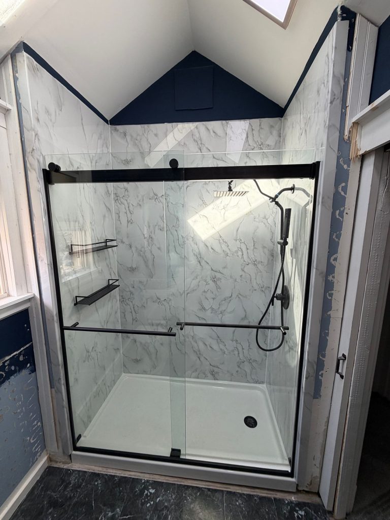 acrylic shower remodel with marble design 