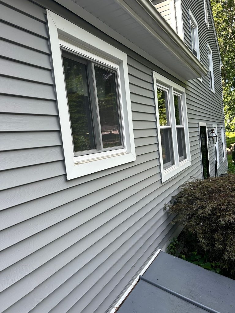 Original second-story window before replacement on Hanover Lane in South Windsor, CT