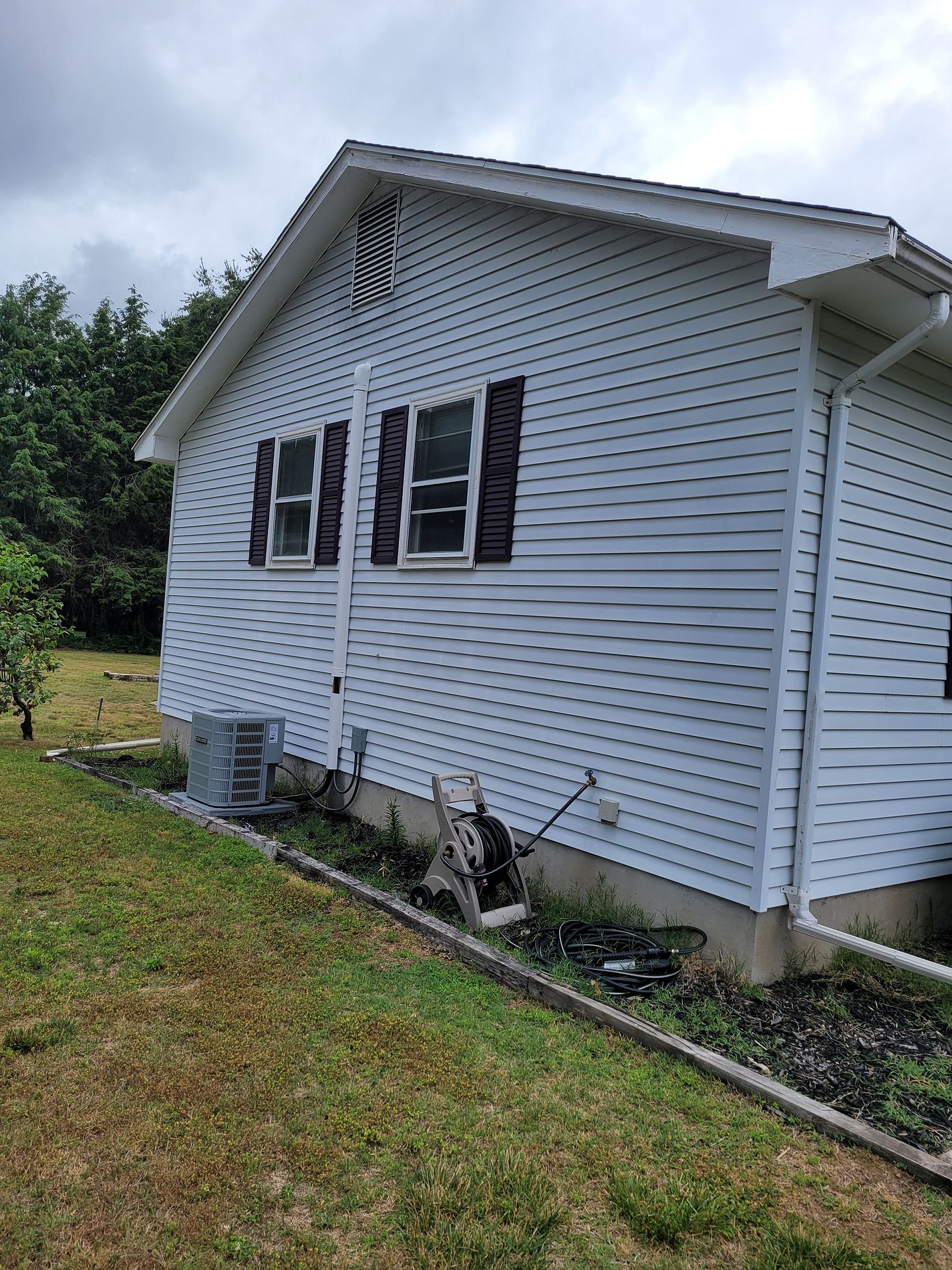 Additional angle of the original window before replacement on Murielle Drive in South Windsor, CT