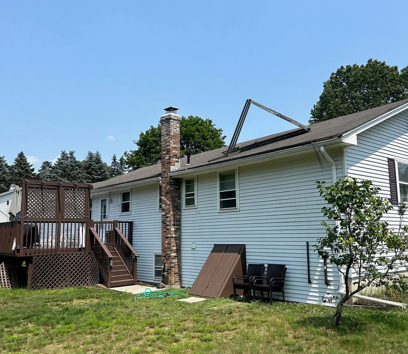 Original side-elevation window before replacement on Murielle Drive in South Windsor, CT
