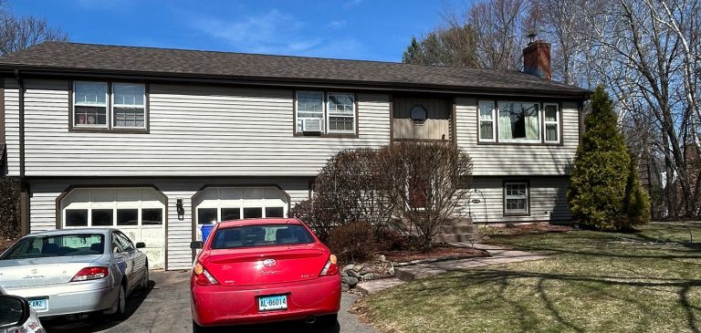 Front elevation after window replacement on Sand Hill Road in South Windsor, CT