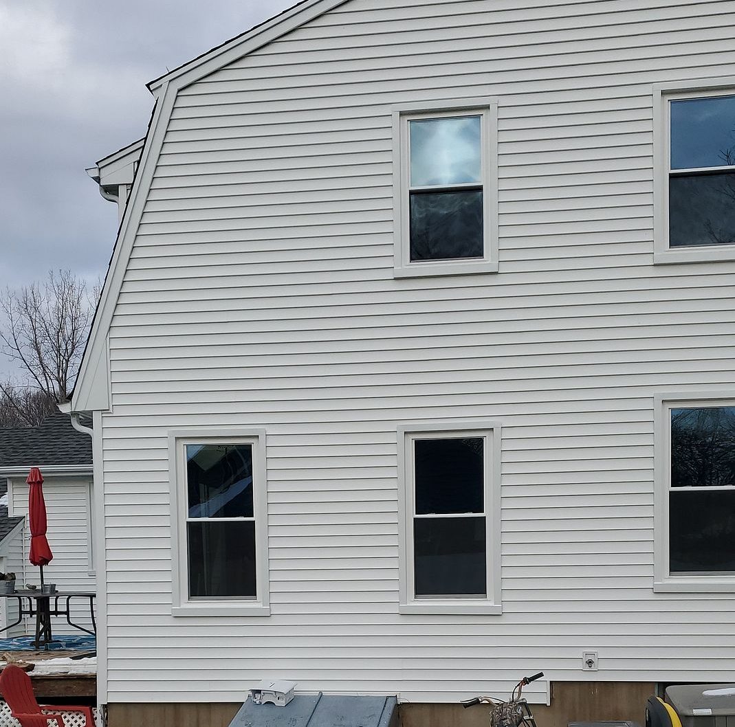 New double-hung windows matched to the original sightlines on a Strawberry Hill colonial in Windsor, CT